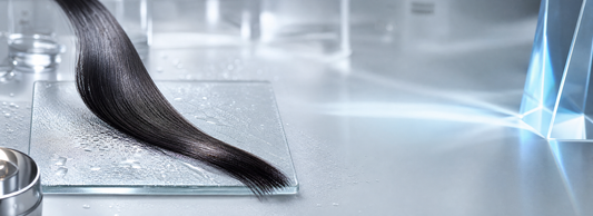 Glossy straight hair beside formaldehyde-free smoothing and caviar protein products